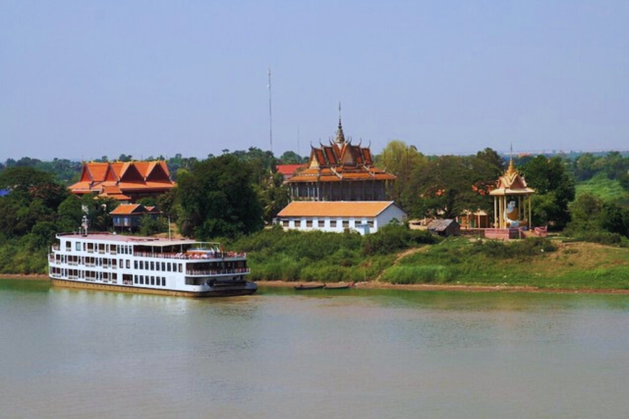Mekong River Cruise sailing past traditional Cambodian temples with Auasia Travel